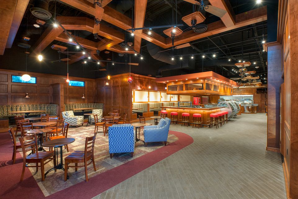 Coffered wood ceiling, lounge seating and bar at Black Walnut Cafe