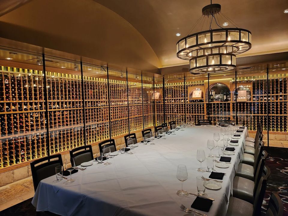 Private dining room lined with wine storage at Del Frisco's
